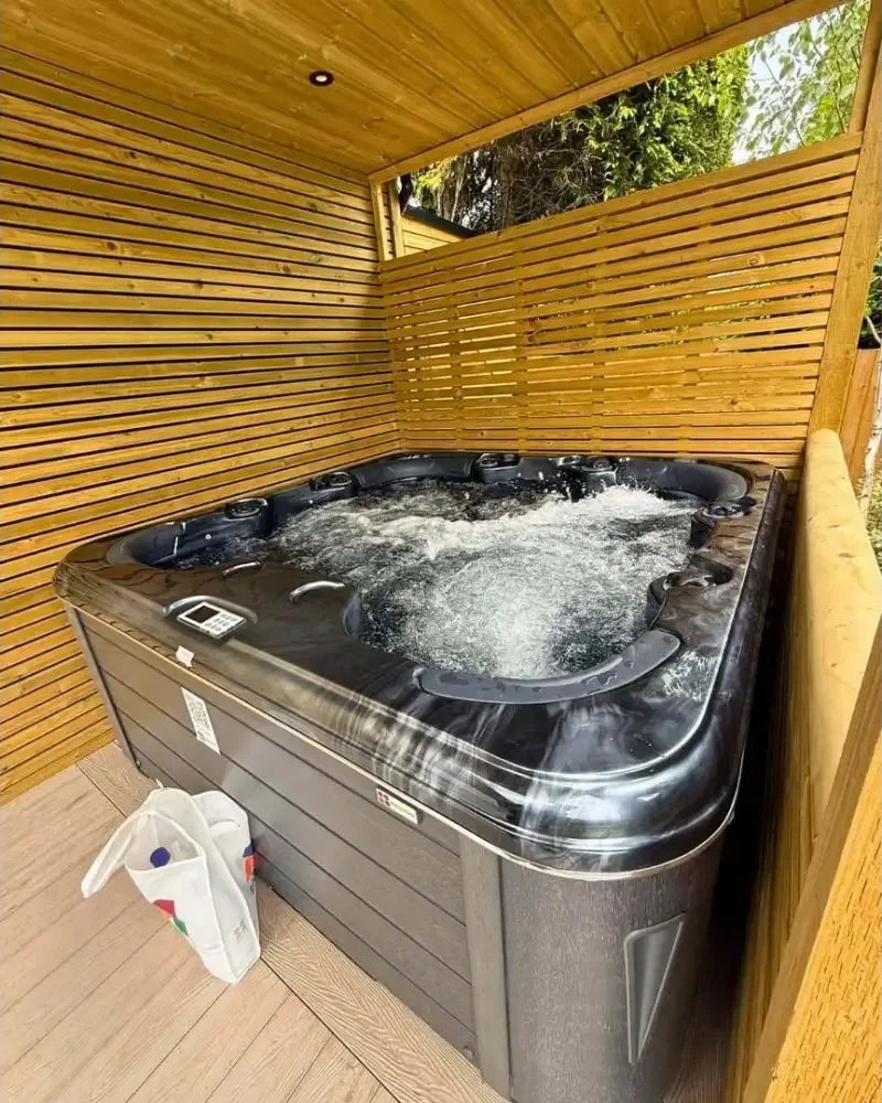 Svartgrå PassionSpa Rewind Spabad Pure Collection med bubblande vatten och panel Svartgrå PassionSpa Rewind Spabad Pure Collection med bubblande vatten och panel